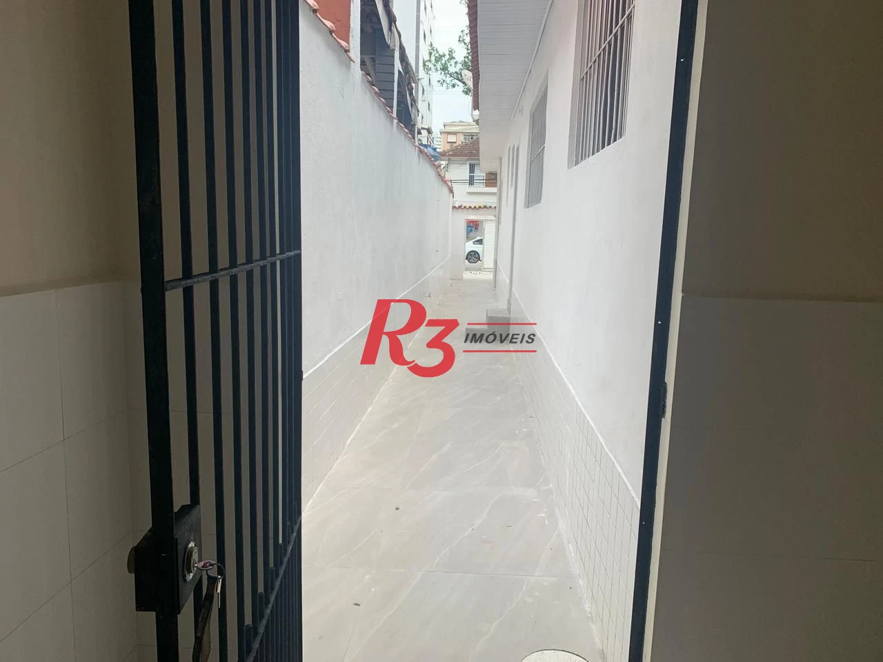 Casa com 2 dormitórios para alugar, 100 m² por R$ 4.100,00/mês - Embaré - Santos/SP