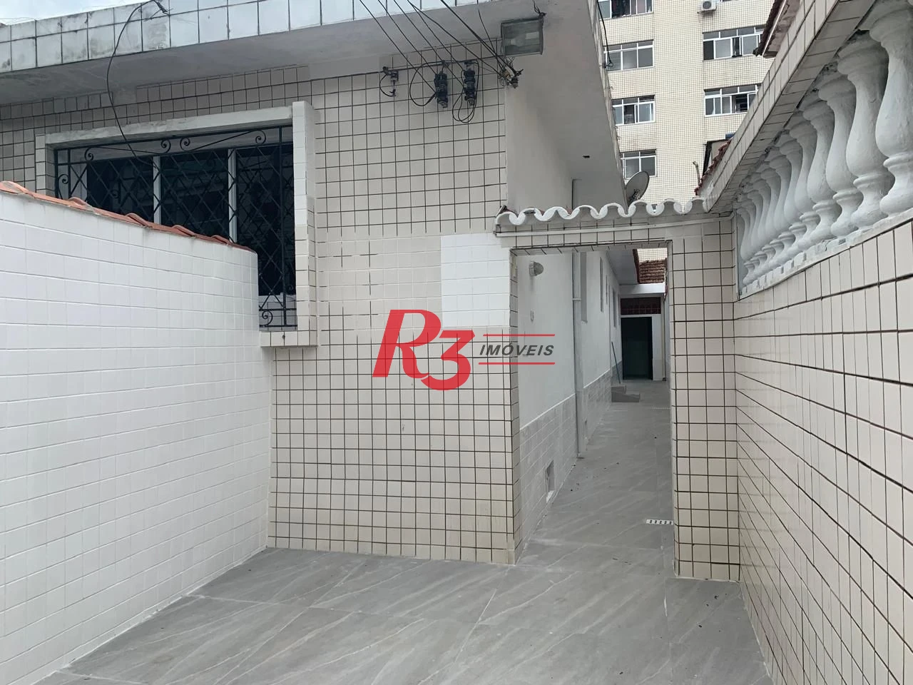 Casa com 2 dormitórios para alugar, 100 m² por R$ 4.100,00/mês - Embaré - Santos/SP