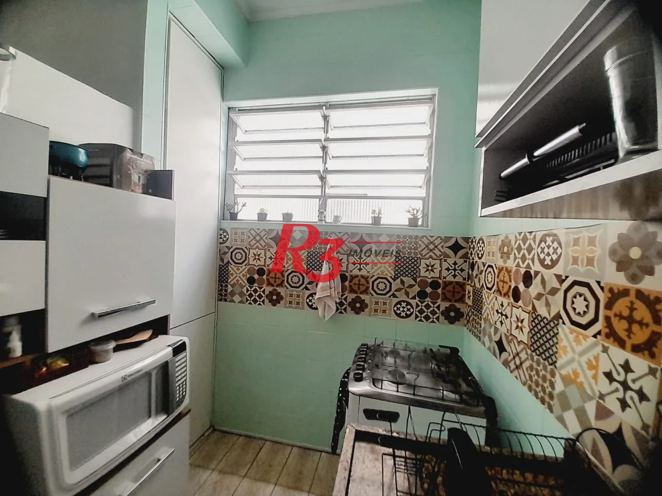 Apartamento à venda, 63 m² por R$ 330.000,00 - Itararé - São Vicente/SP