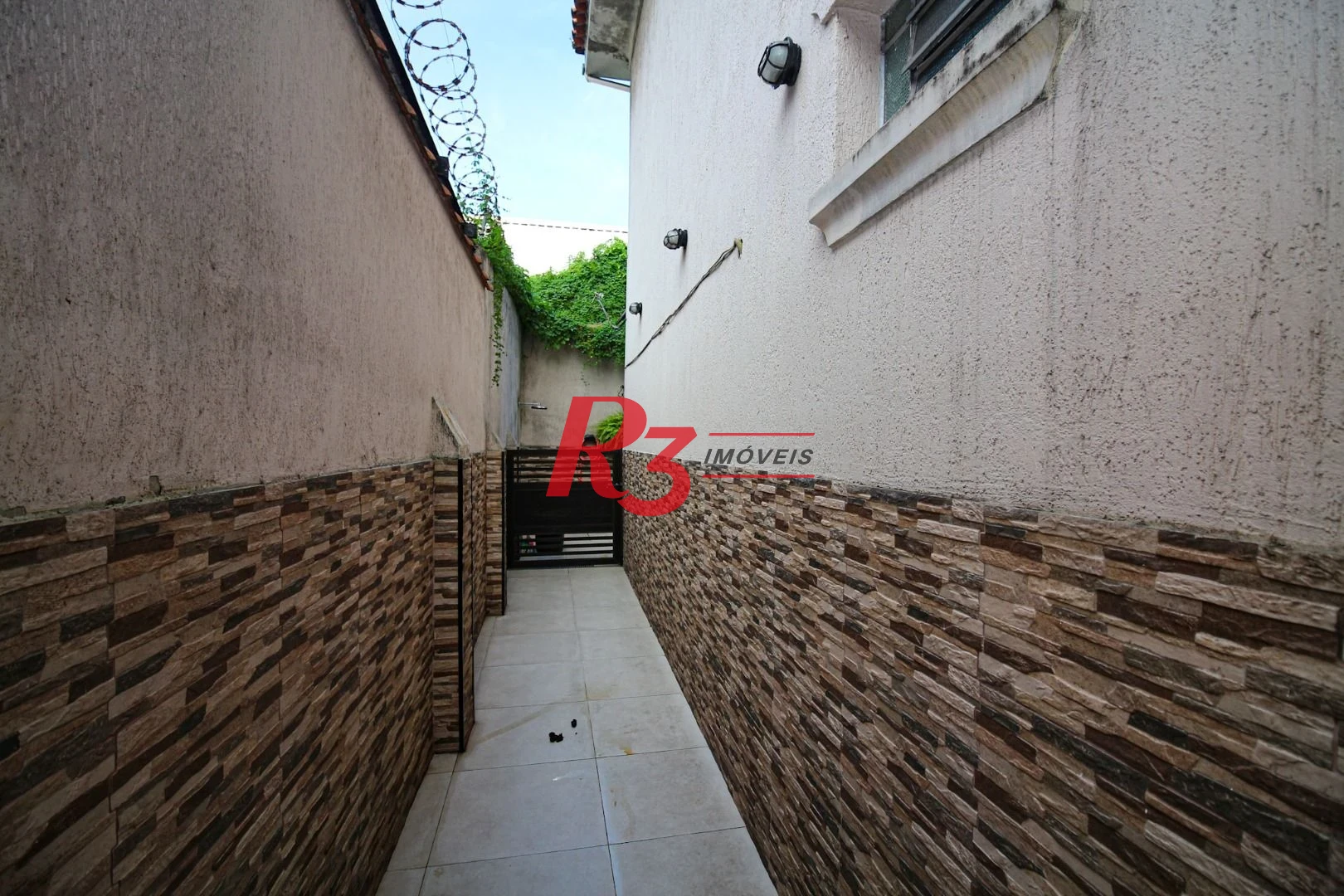 Casa à venda, 165 m² por R$ 870.000,00 - Macuco - Santos/SP