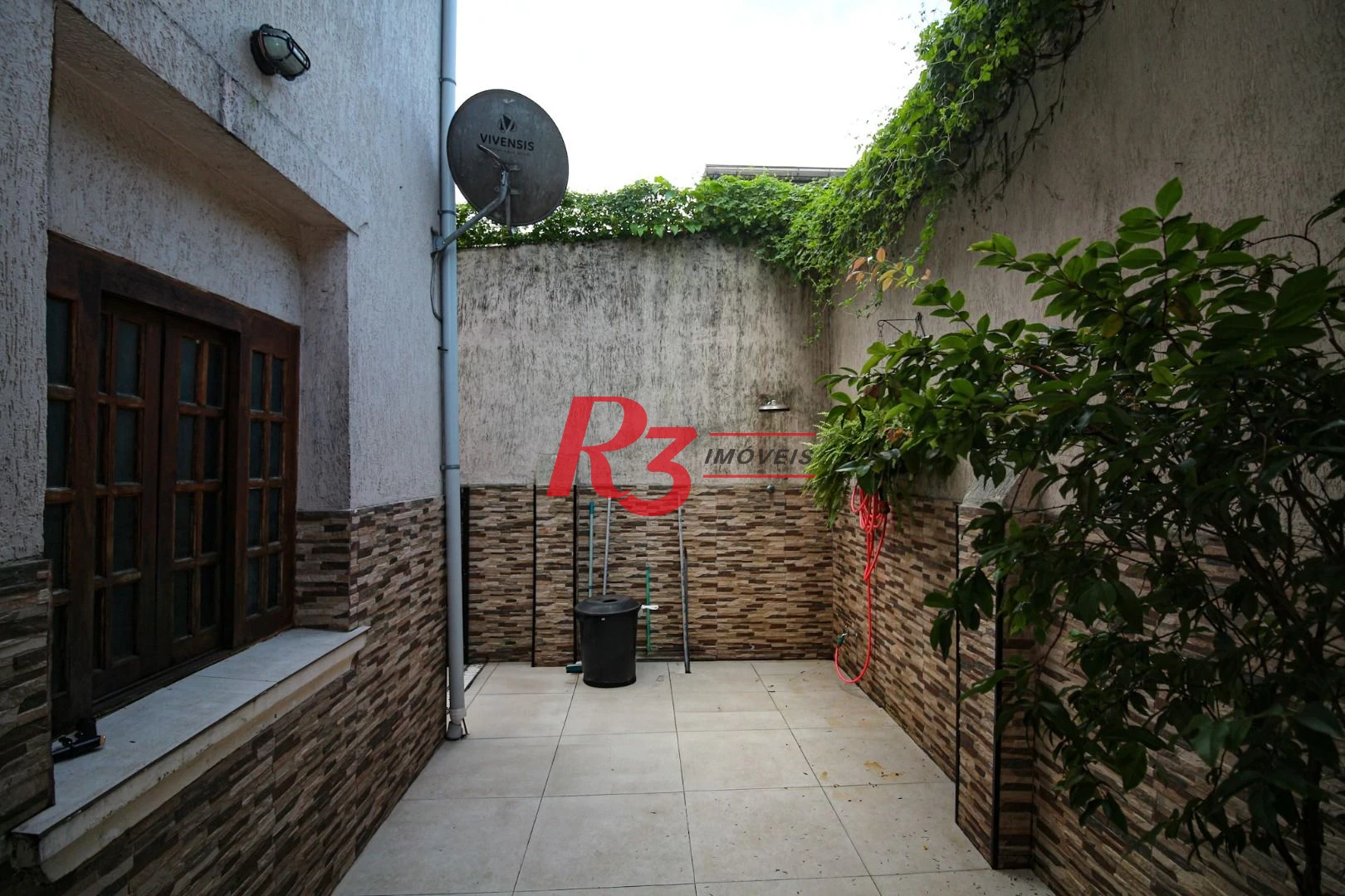 Casa à venda, 165 m² por R$ 870.000,00 - Macuco - Santos/SP