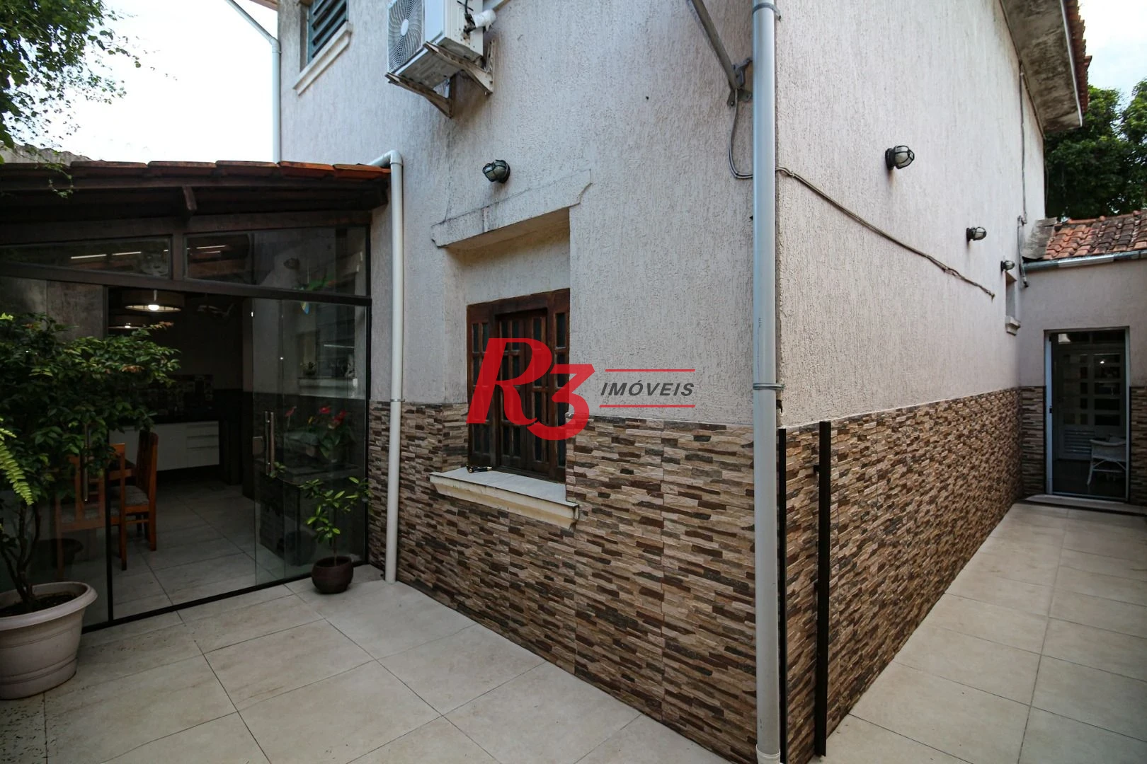 Casa à venda, 165 m² por R$ 870.000,00 - Macuco - Santos/SP