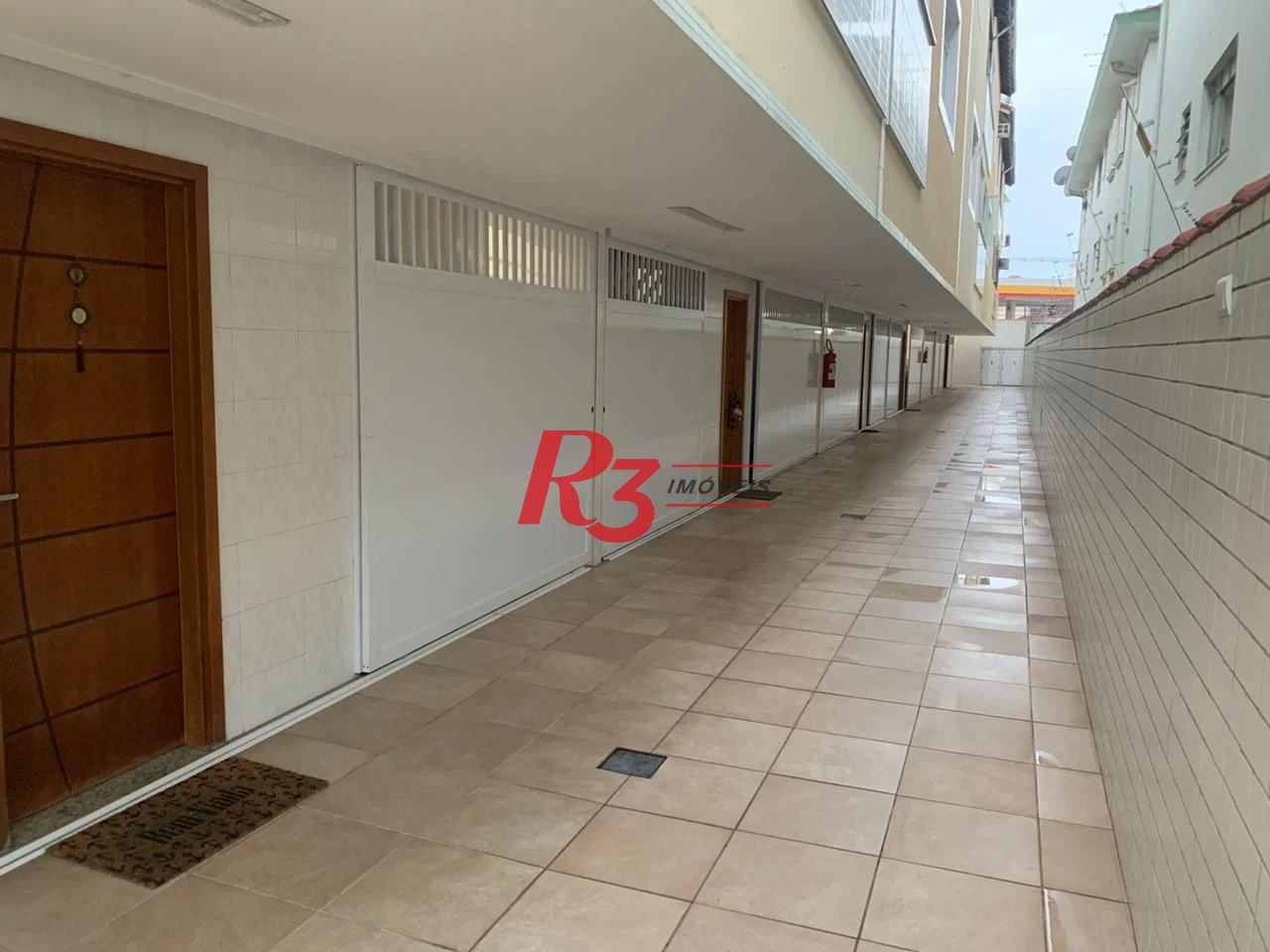 Village com 3 dormitórios à venda, 186 m² por R$ 1.065.000,00 - Gonzaga - Santos/SP