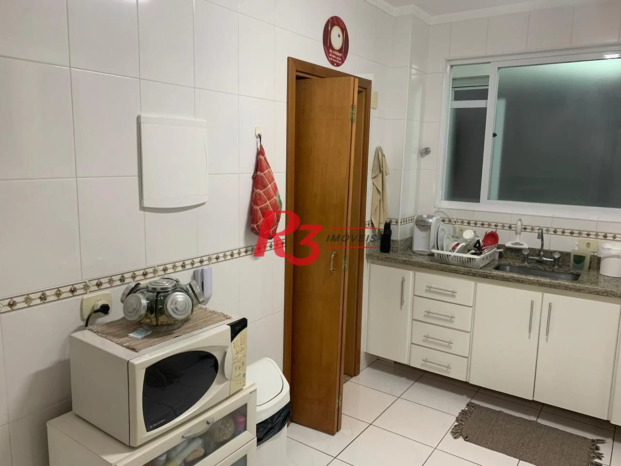Village com 3 dormitórios à venda, 186 m² por R$ 1.065.000,00 - Gonzaga - Santos/SP