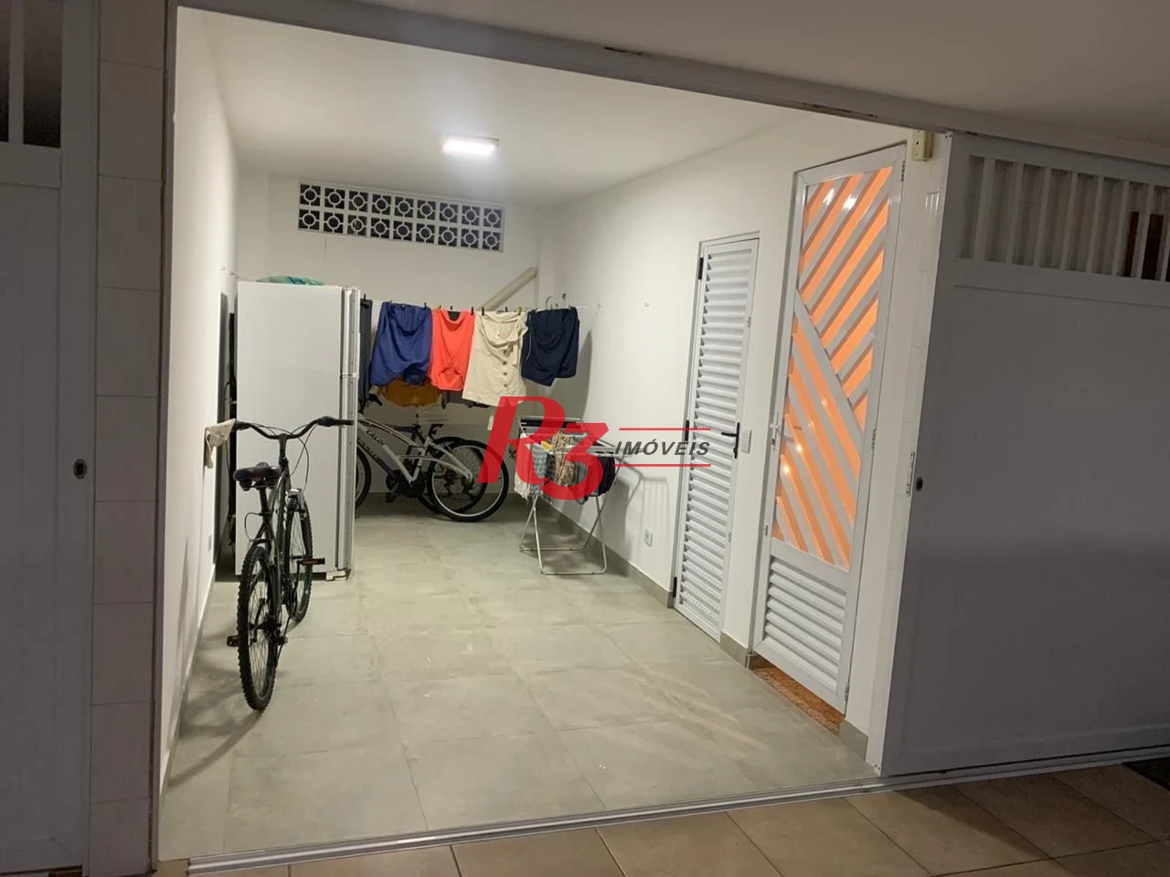 Village com 3 dormitórios à venda, 186 m² por R$ 1.065.000,00 - Gonzaga - Santos/SP