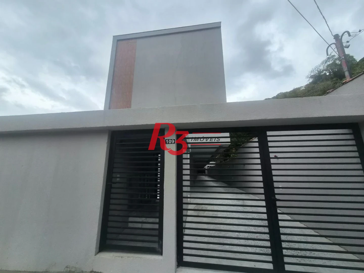 Village com 2 dormitórios à venda, 90 m² por R$ 560.000,00 - Marapé - Santos/SP