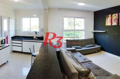 Apartamento com 2 dormitórios à venda, 58 m² por R$ 282.000,00 - Vila Voturuá - São Vicente/SP
