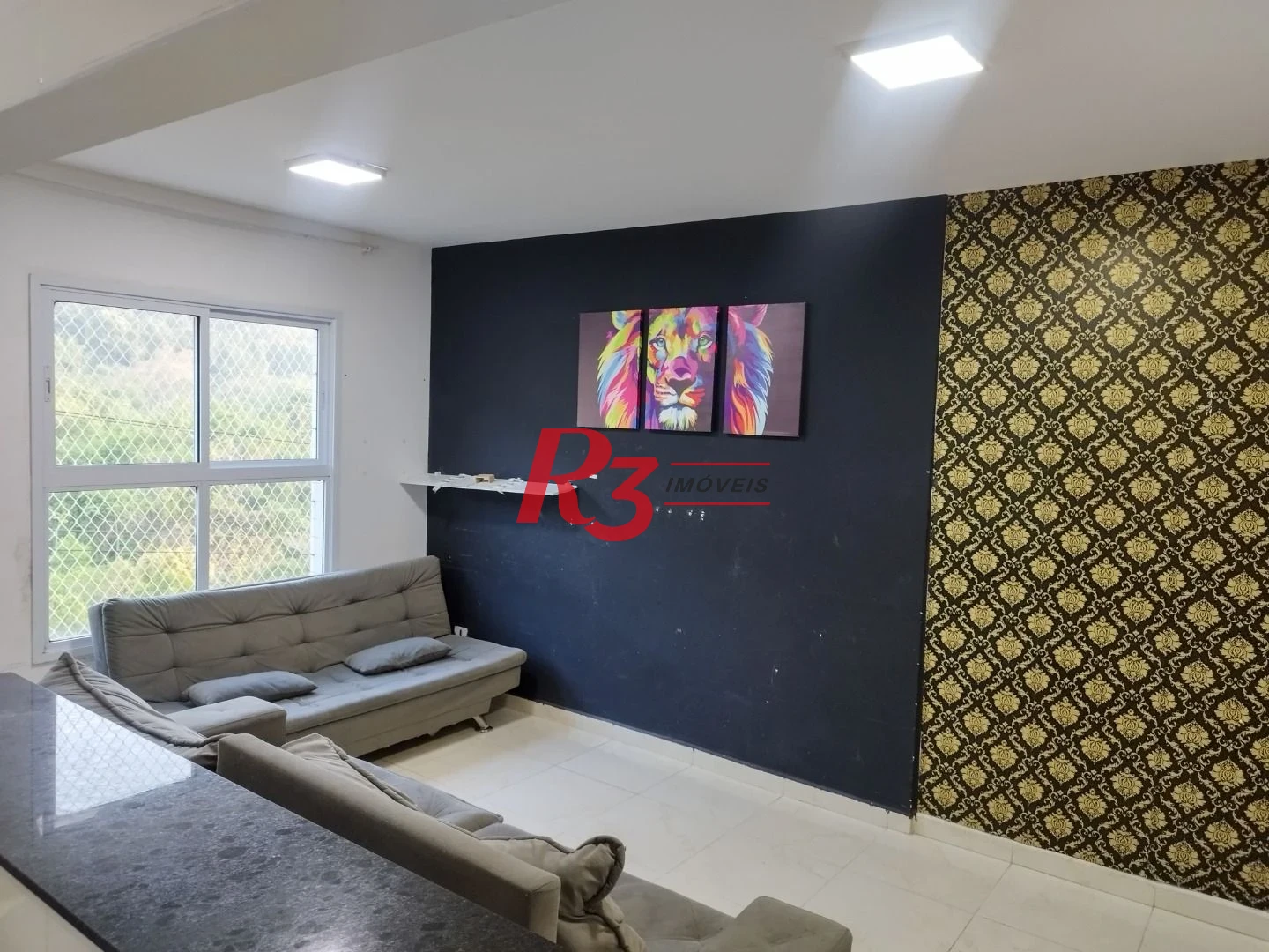 Apartamento com 2 dormitórios à venda, 58 m² por R$ 282.000,00 - Vila Voturuá - São Vicente/SP