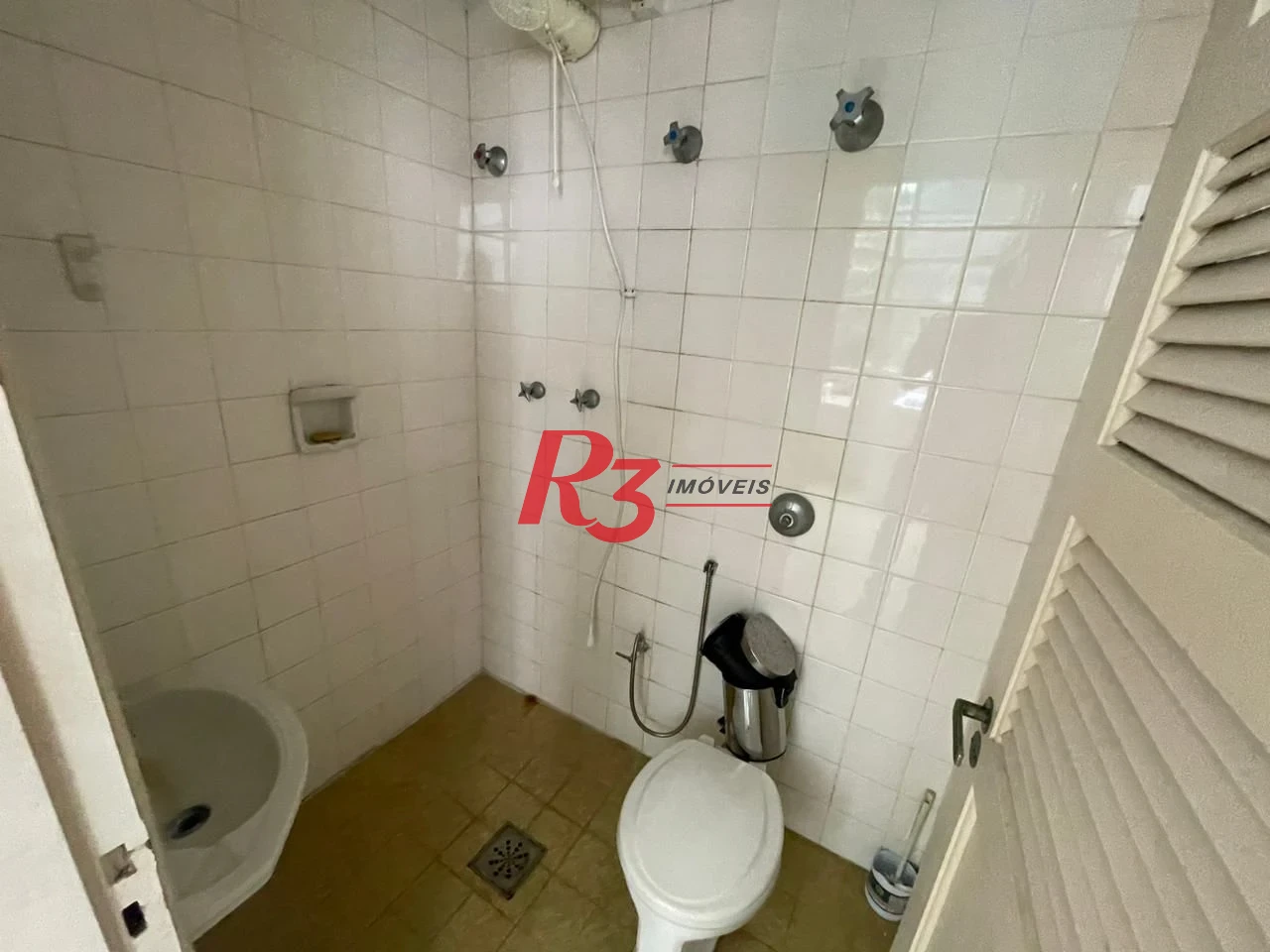 Apartamento com 4 dormitórios à venda, 235 m² por R$ 1.400.000,00 - Ilha Porchat - São Vicente/SP