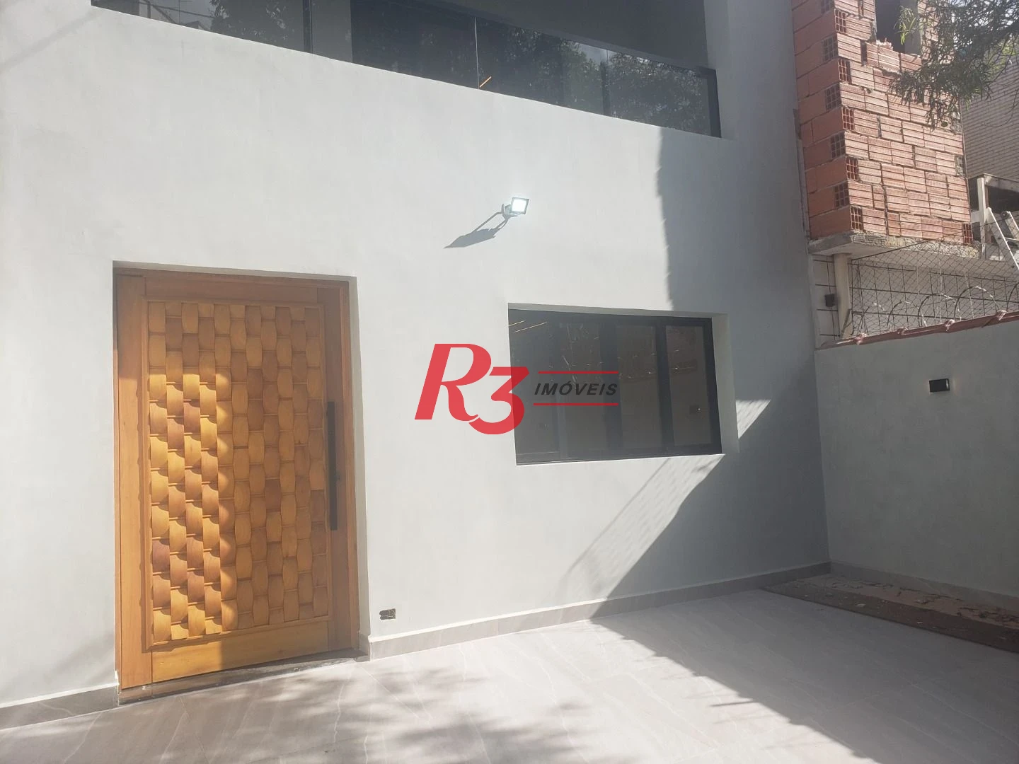 Sobrado com 3 suítes à venda, 200 m² por R$ 1.950.000 - Embaré - Santos/SP