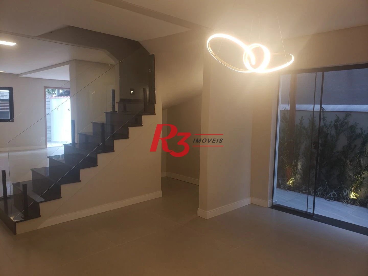 Sobrado com 3 suítes à venda, 200 m² por R$ 1.950.000 - Embaré - Santos/SP