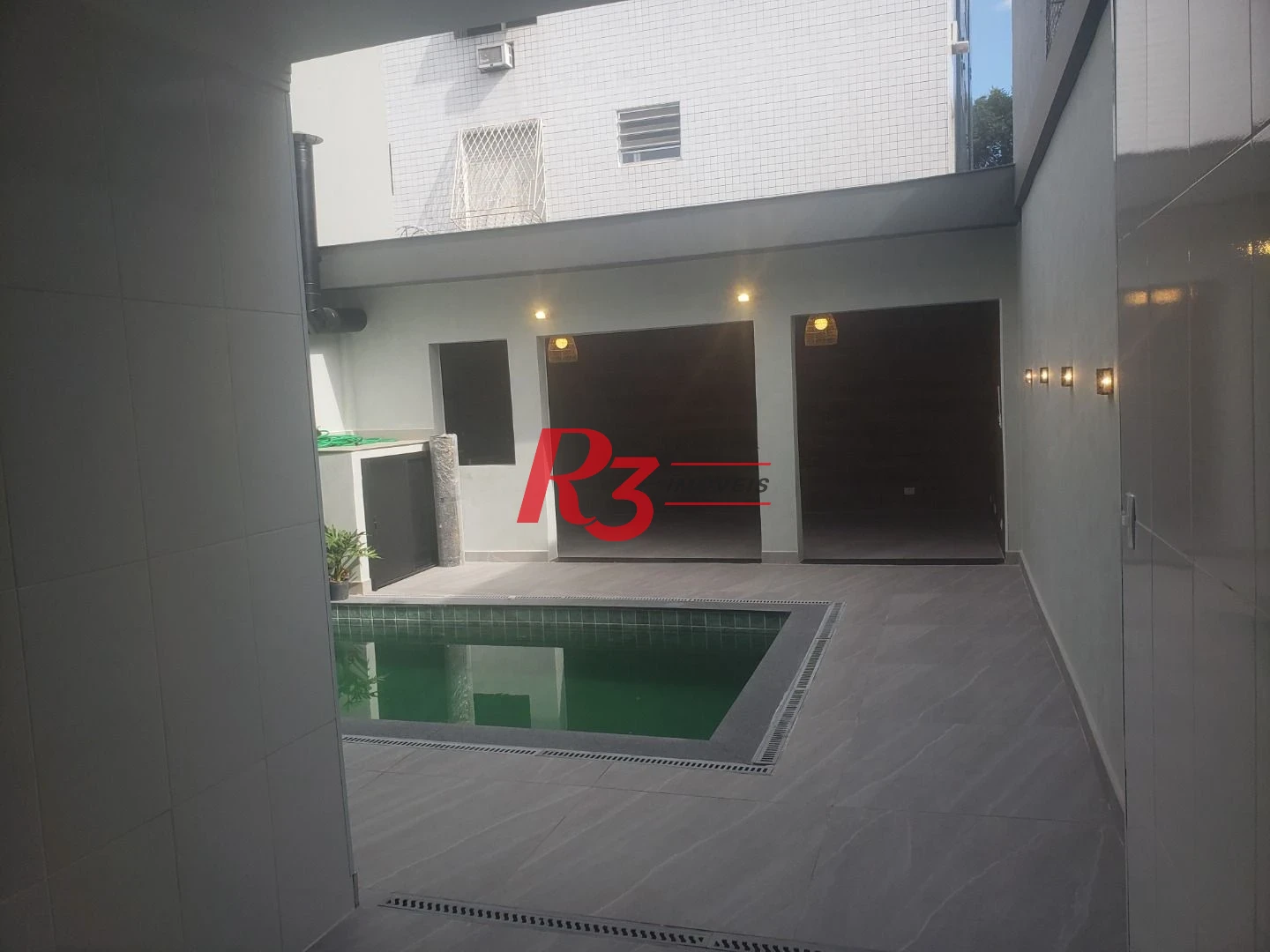 Sobrado com 3 suítes à venda, 200 m² por R$ 1.950.000 - Embaré - Santos/SP
