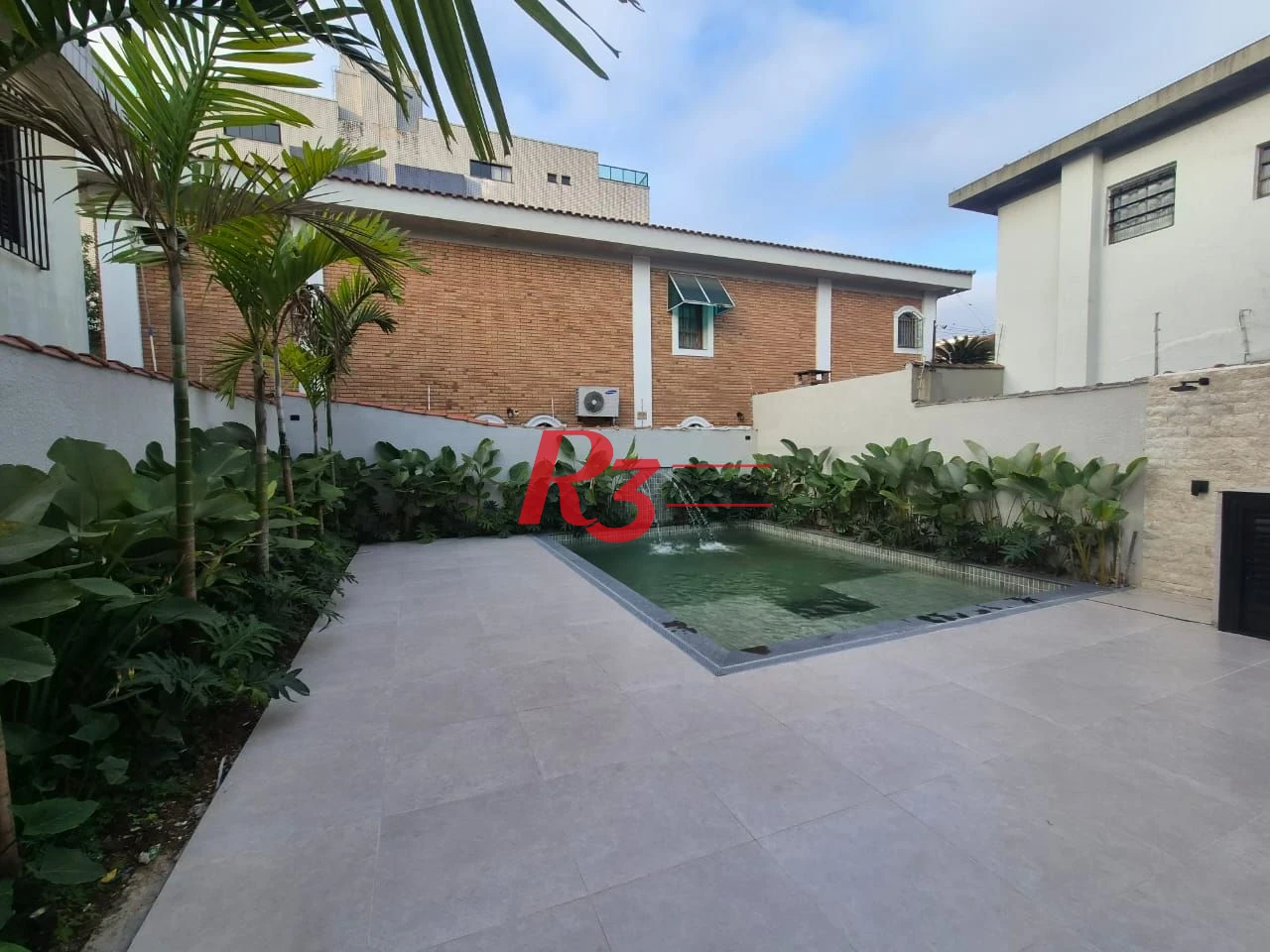 Casa com 3 dormitórios à venda, 260 m² por R$ 3.790.000,00 - Embaré - Santos/SP