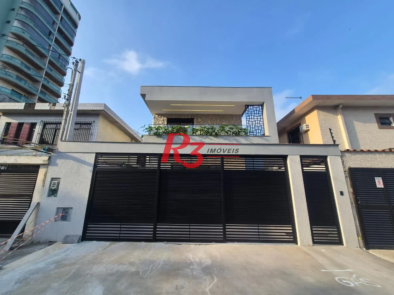 Casa com 3 dormitórios à venda, 260 m² por R$ 3.790.000,00 - Embaré - Santos/SP