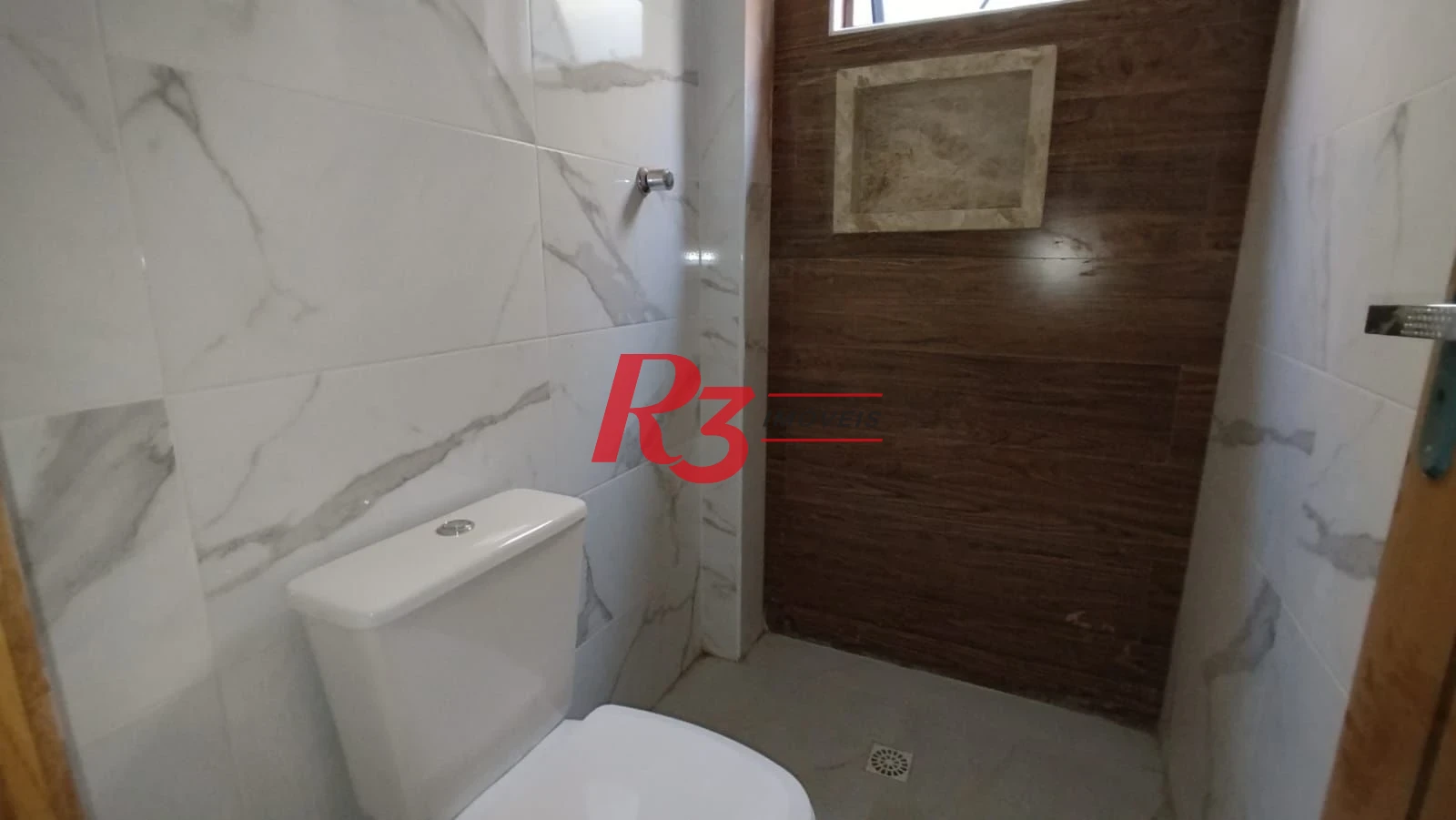 Casa com 3 dormitórios à venda, 200 m² por R$ 1.050.000,00 - Embaré - Santos/SP