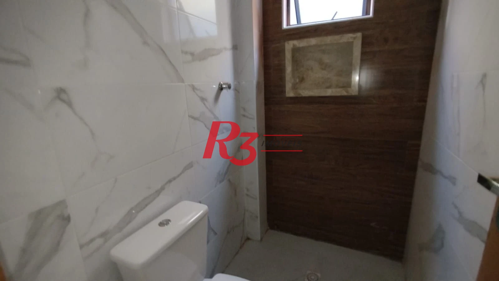 Casa com 3 dormitórios à venda, 200 m² por R$ 1.050.000,00 - Embaré - Santos/SP