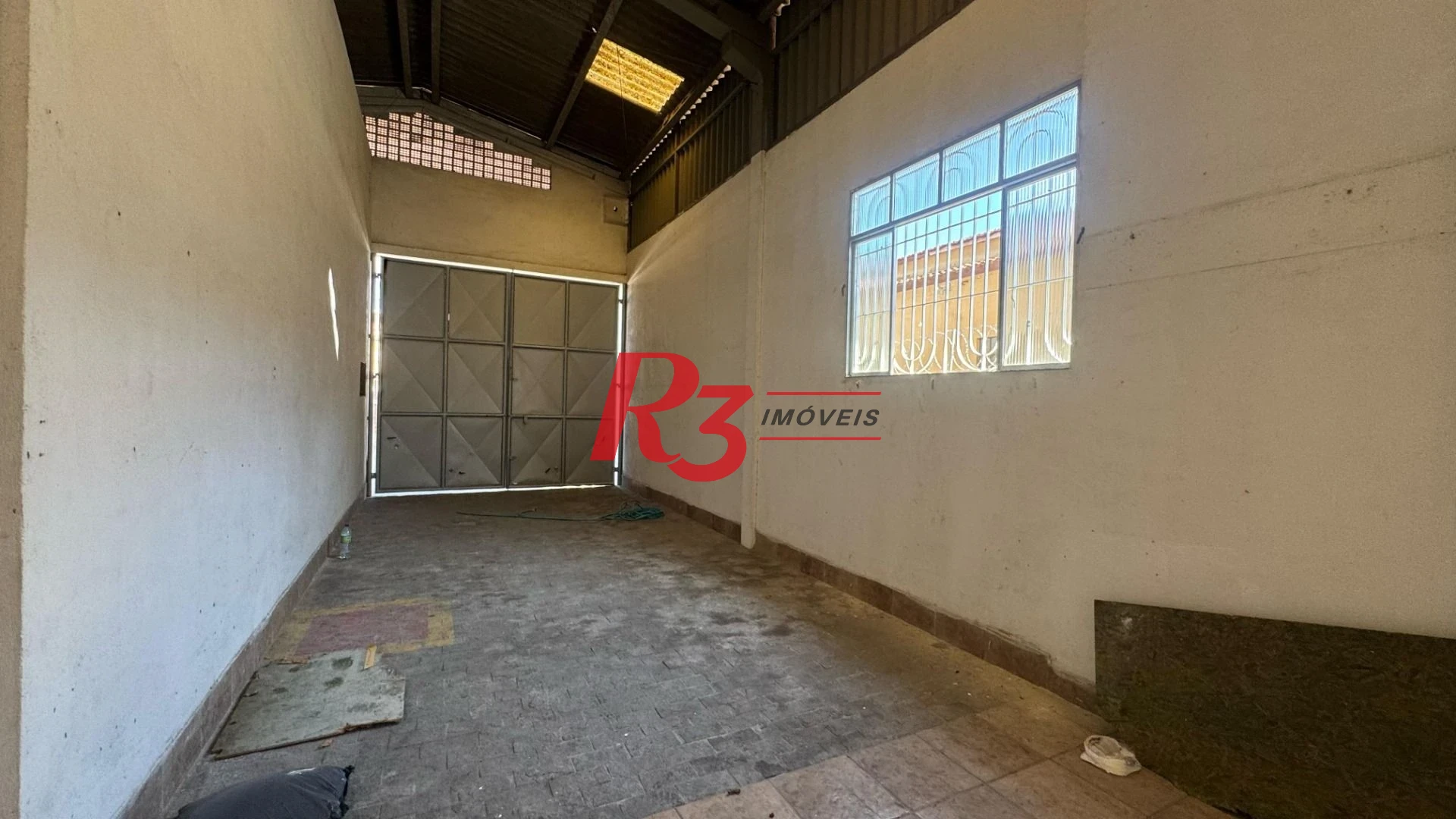 Galpão para alugar, 347 m² por R$ 11.750,00/mês - Parque Bitaru - São Vicente/SP
