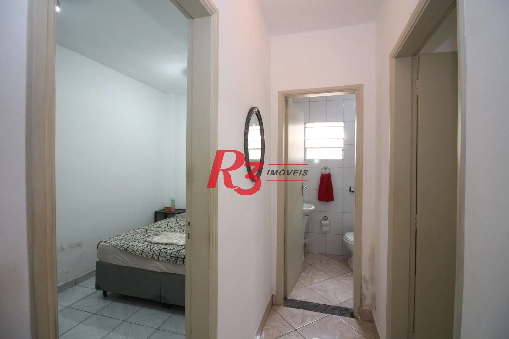 Casa à venda, 212 m² por R$ 880.000,00 - Estuário - Santos/SP