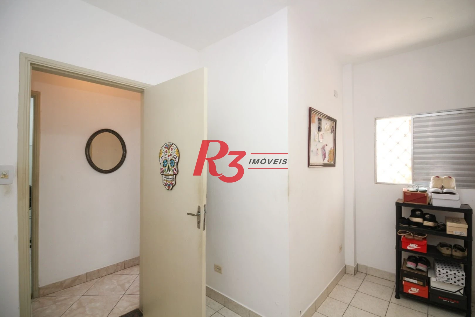 Casa à venda, 212 m² por R$ 880.000,00 - Estuário - Santos/SP