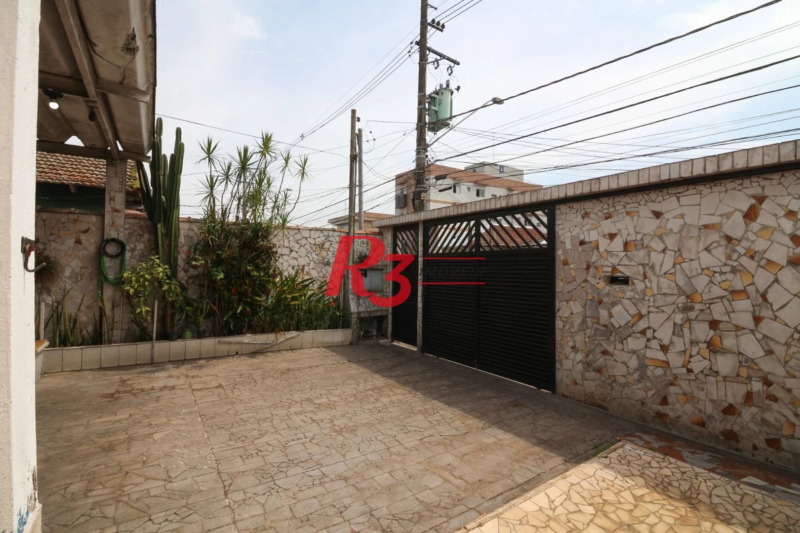 Casa à venda, 212 m² por R$ 880.000,00 - Estuário - Santos/SP