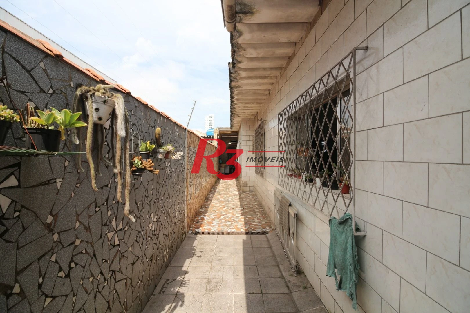 Casa à venda, 212 m² por R$ 880.000,00 - Estuário - Santos/SP