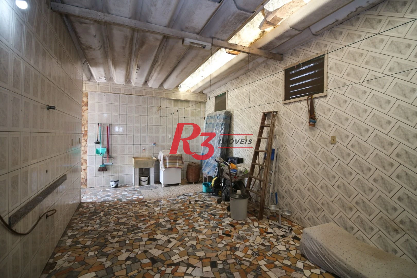 Casa à venda, 212 m² por R$ 880.000,00 - Estuário - Santos/SP