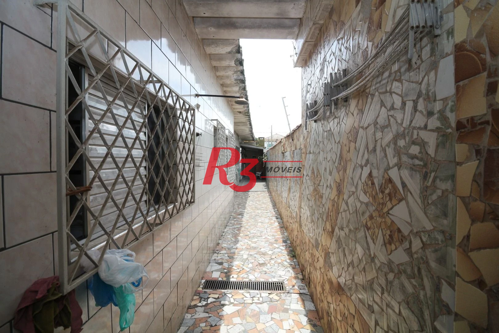 Casa à venda, 212 m² por R$ 880.000,00 - Estuário - Santos/SP