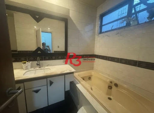 Casa com 3 dormitórios, 170 m² - venda por R$ 1.600.000,00 ou aluguel por R$ 12.000,00 - Gonzaga - Santos/SP