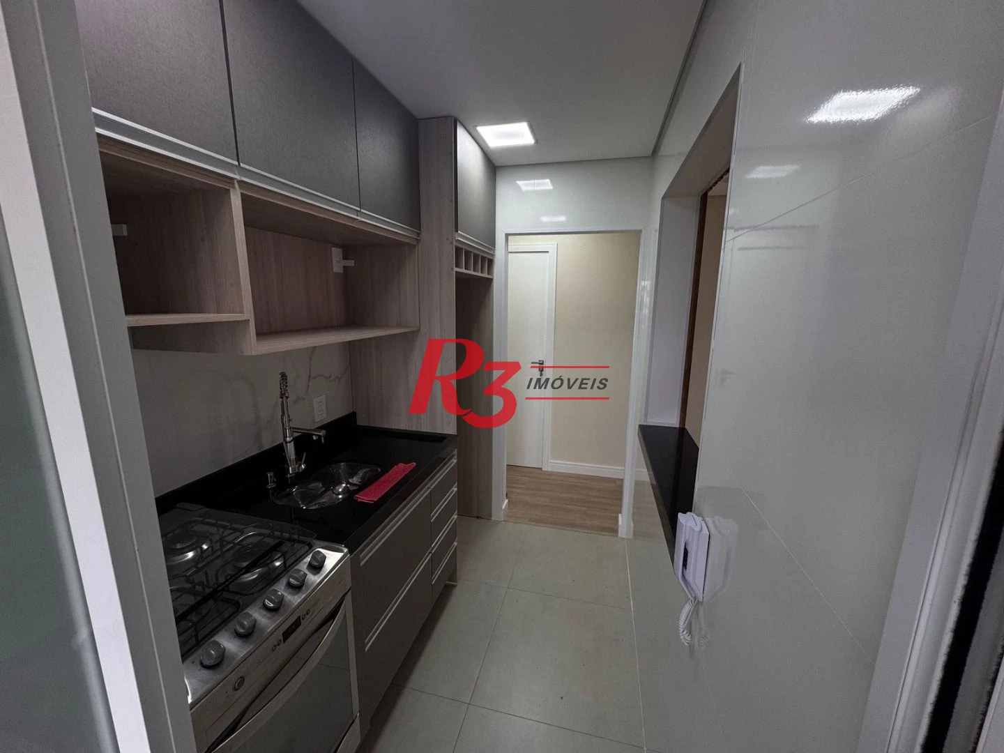 Apartamento com 3 dormitórios à venda, 69 m² por R$ 440.000,00 - Areia Branca - Santos/SP