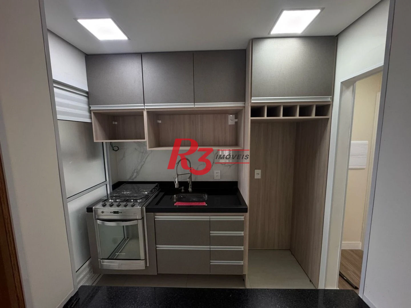 Apartamento com 3 dormitórios à venda, 69 m² por R$ 440.000,00 - Areia Branca - Santos/SP