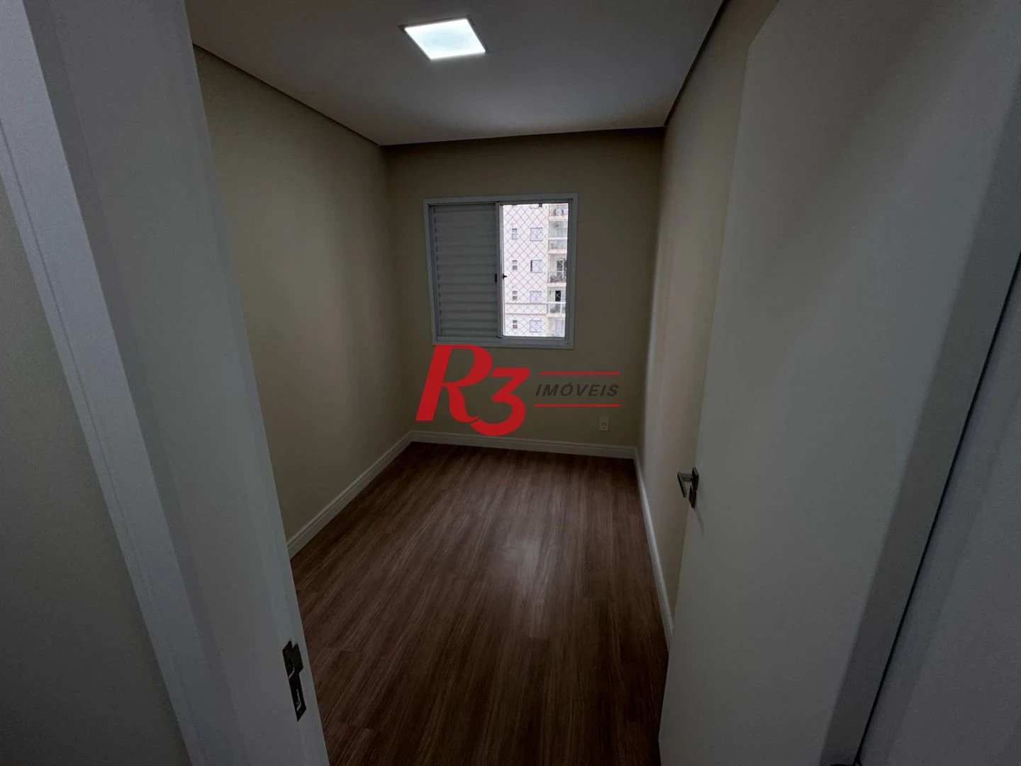 Apartamento com 3 dormitórios à venda, 69 m² por R$ 440.000,00 - Areia Branca - Santos/SP