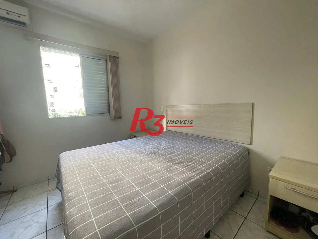 Casa com 3 dormitórios à venda, 111 m² por R$ 690.000,00 - Marapé - Santos/SP