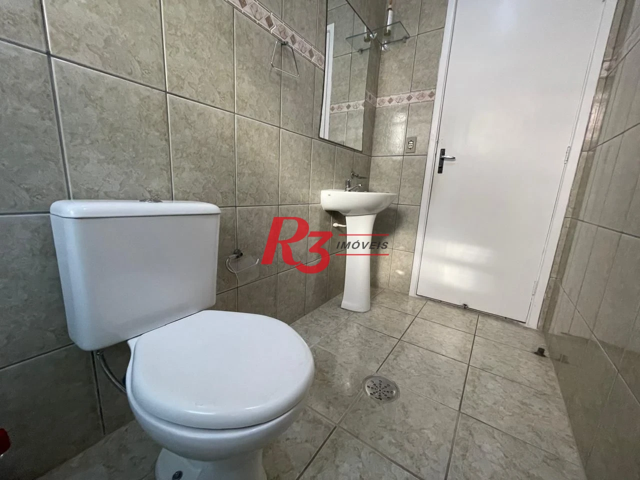 Casa com 3 dormitórios à venda, 111 m² por R$ 690.000,00 - Marapé - Santos/SP
