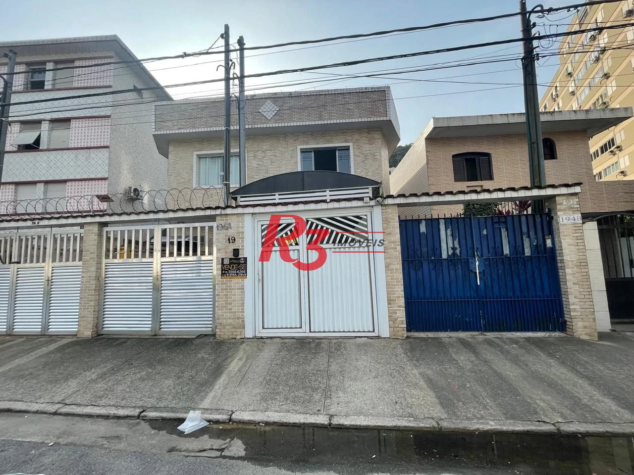Casa com 3 dormitórios à venda, 111 m² por R$ 690.000,00 - Marapé - Santos/SP