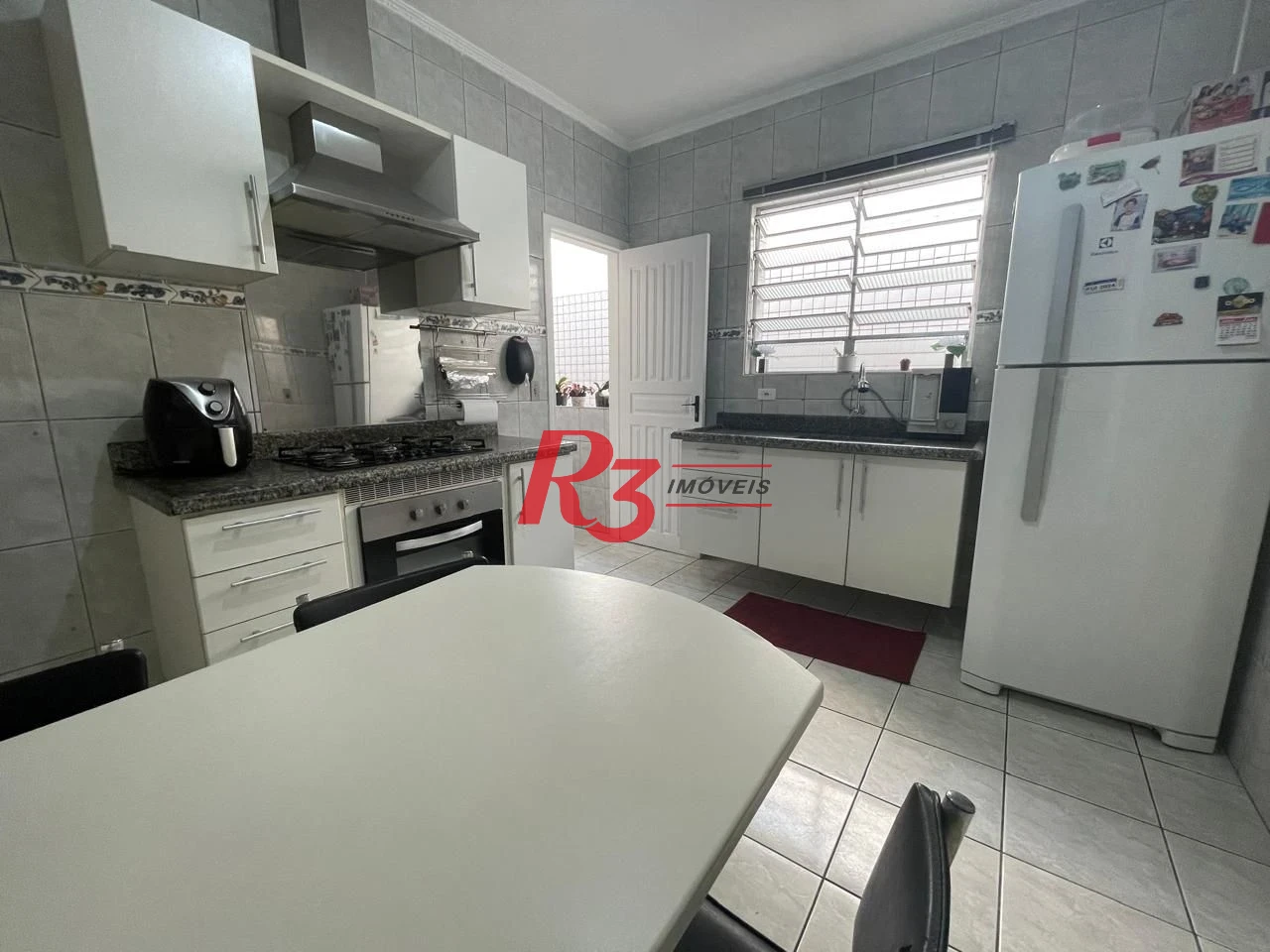 Casa com 3 dormitórios à venda, 111 m² por R$ 690.000,00 - Marapé - Santos/SP
