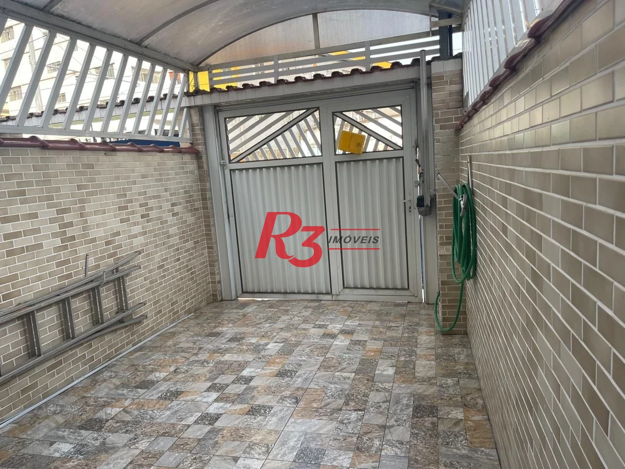 Casa com 3 dormitórios à venda, 111 m² por R$ 690.000,00 - Marapé - Santos/SP