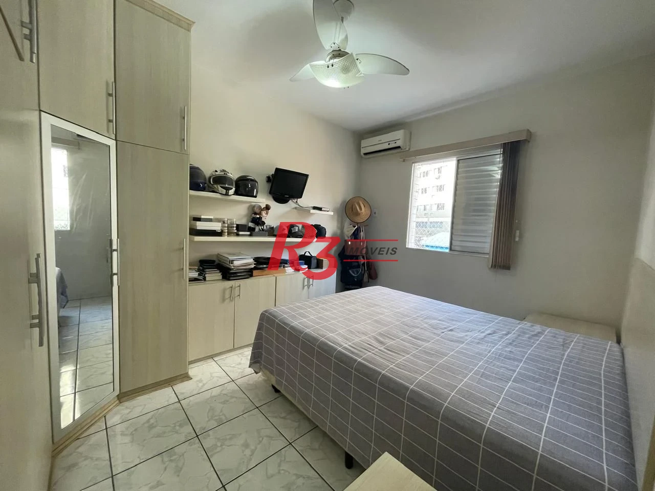 Casa com 3 dormitórios à venda, 111 m² por R$ 690.000,00 - Marapé - Santos/SP