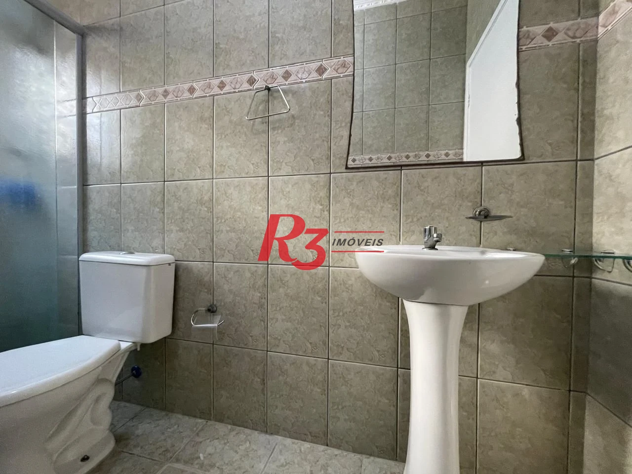 Casa com 3 dormitórios à venda, 111 m² por R$ 690.000,00 - Marapé - Santos/SP