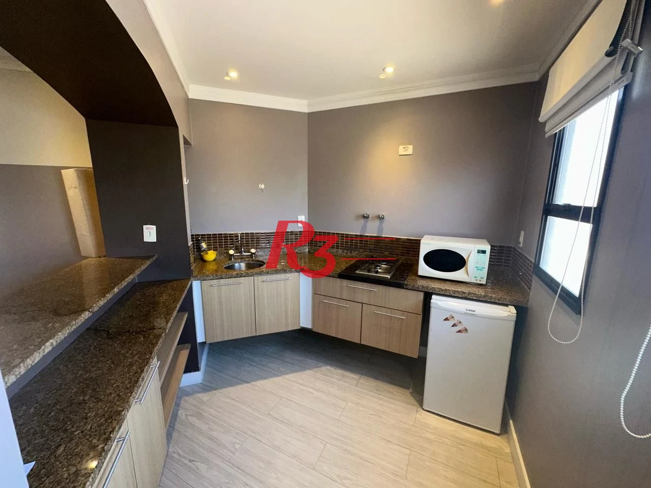 Flat 1 dormitório, sala e varanda  à venda, 44 m² por R$ 428.000 - Gonzaga - Santos/SP