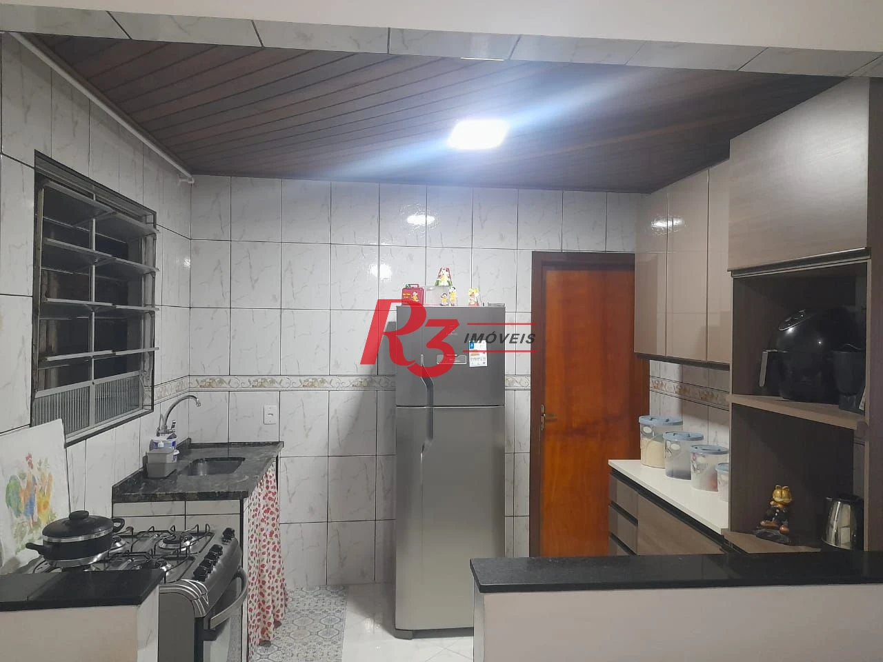 Casa com 3 dormitórios à venda, 95 m² por R$ 250.000,00 - Saboó - Santos/SP