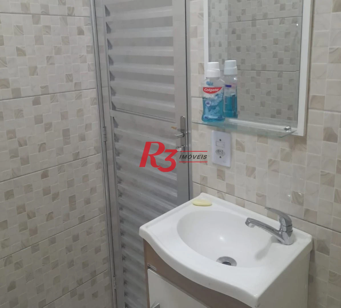 Casa com 3 dormitórios à venda, 95 m² por R$ 250.000,00 - Saboó - Santos/SP