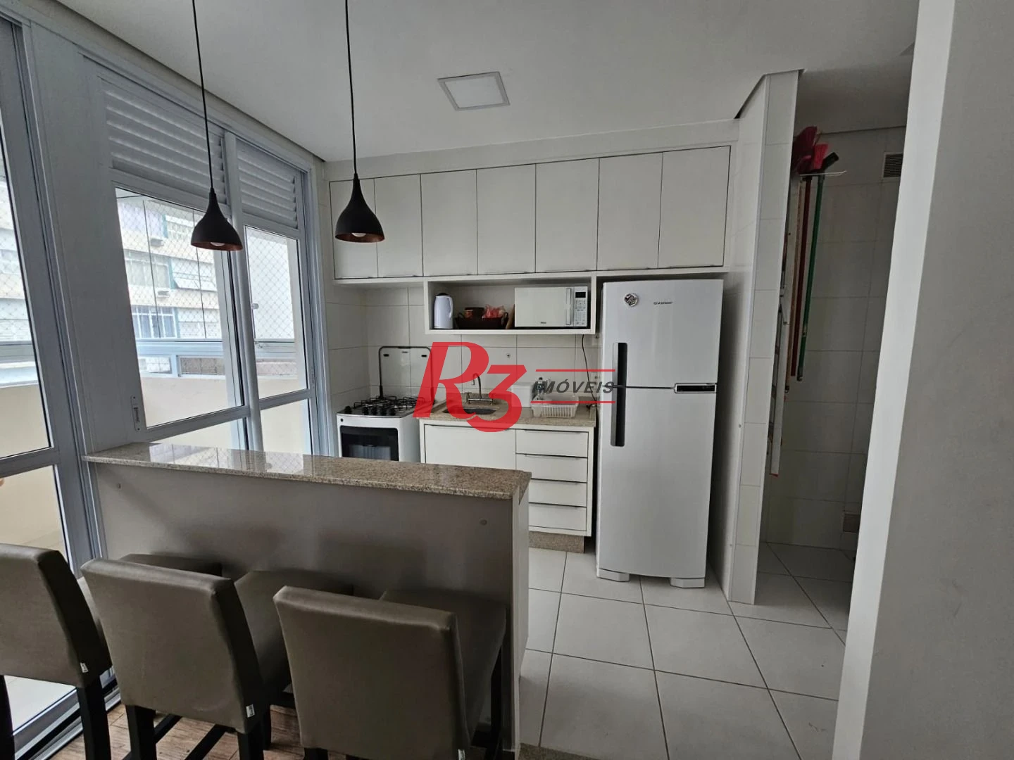 Apartamento com 2 dormitórios à venda, 72 m² por R$ 900.000,00 - Gonzaga - Santos/SP