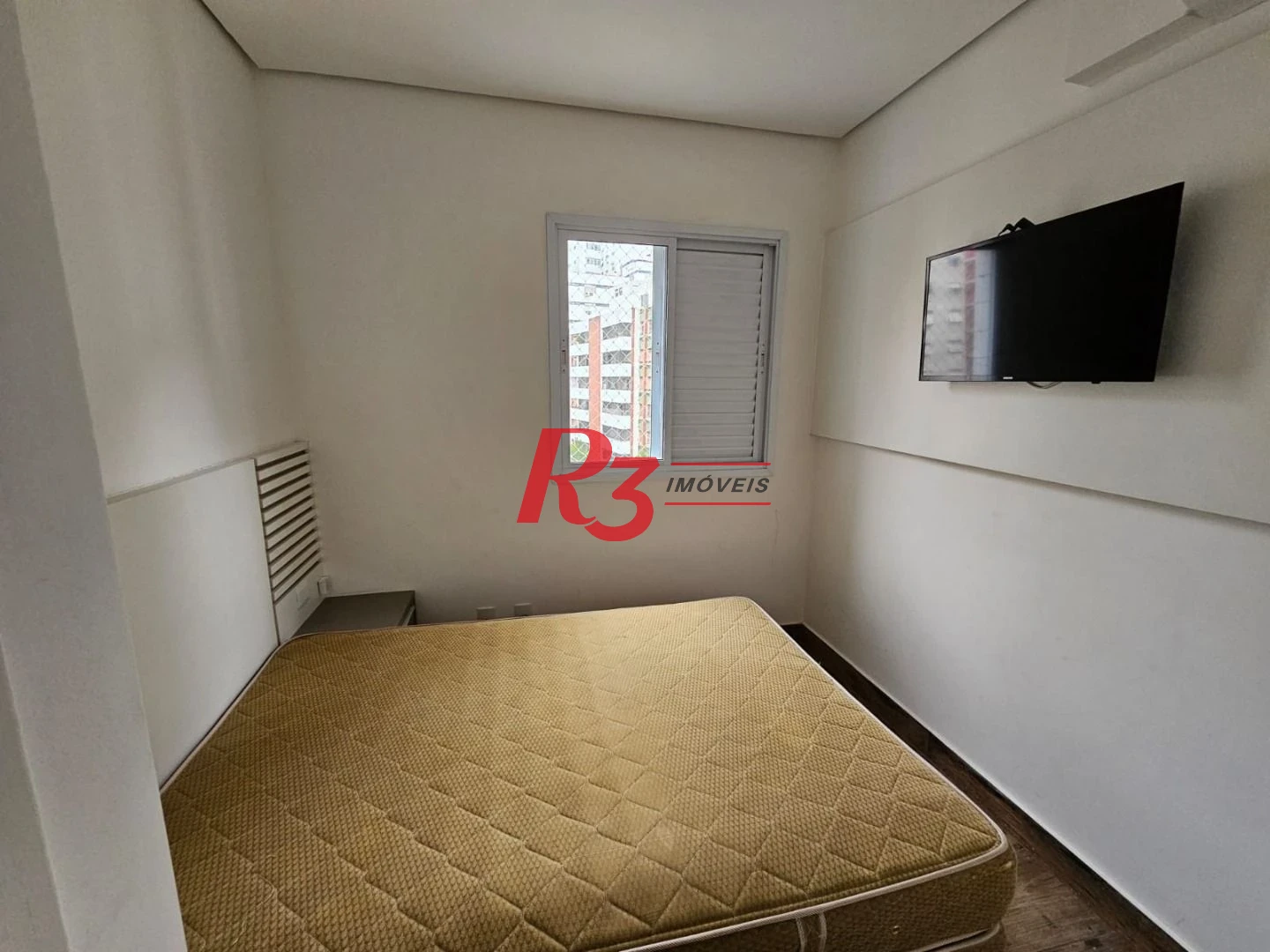 Apartamento com 2 dormitórios à venda, 72 m² por R$ 900.000,00 - Gonzaga - Santos/SP
