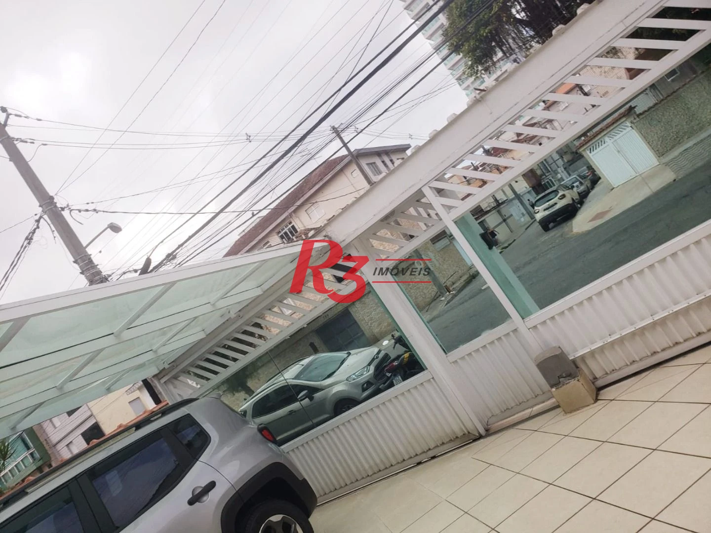 Sobrado, 380 m² - venda por R$ 3.000.000,00 ou aluguel por R$ 20.860,00/mês - Embaré - Santos/SP