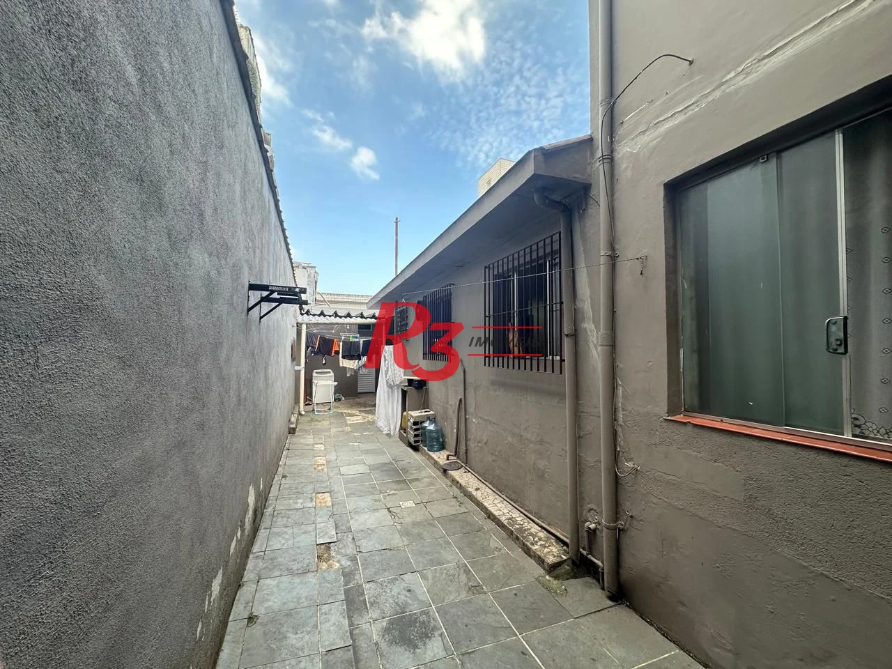 Casa com 6 dormitórios, 223 m² - venda por R$ 900.000,00 ou aluguel por R$ 9.910,60/mês - Vila Matias - Santos/SP