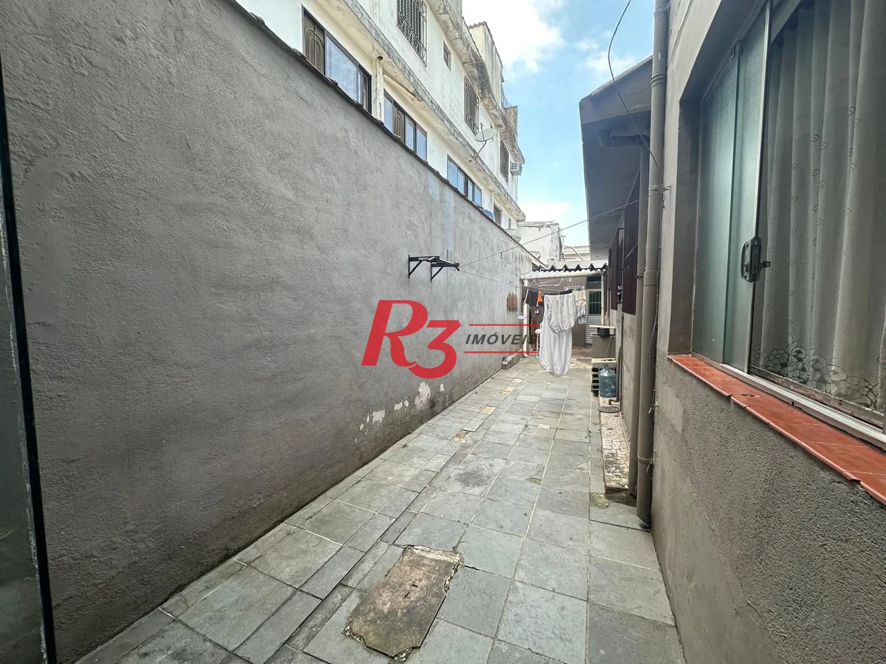 Casa com 6 dormitórios, 223 m² - venda por R$ 900.000,00 ou aluguel por R$ 9.910,60/mês - Vila Matias - Santos/SP