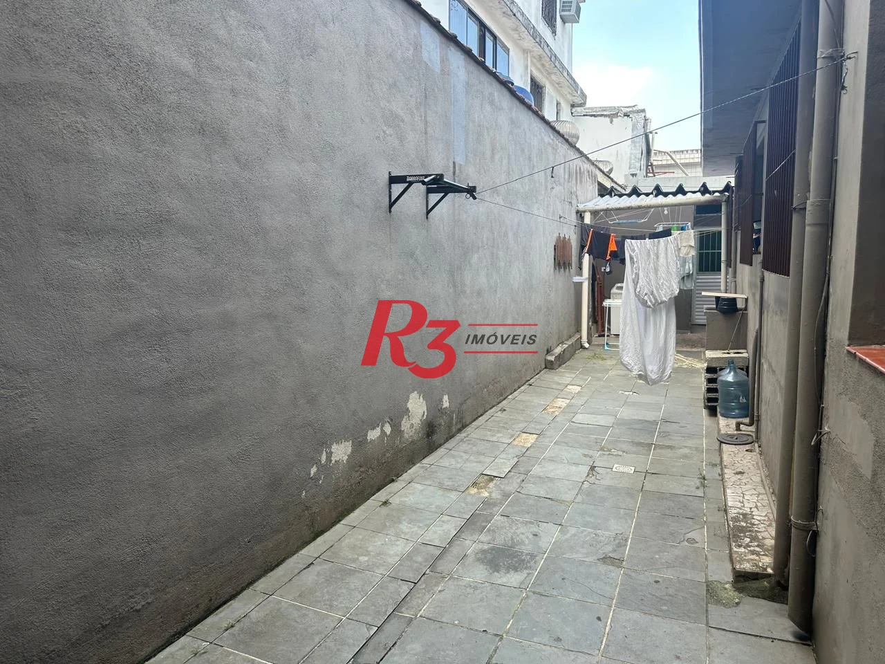 Casa com 6 dormitórios, 223 m² - venda por R$ 900.000,00 ou aluguel por R$ 9.910,60/mês - Vila Matias - Santos/SP