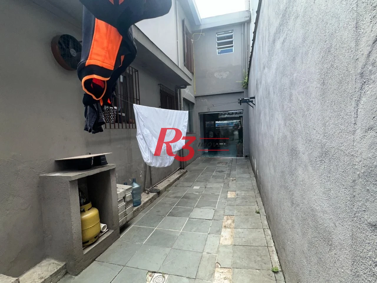 Casa com 6 dormitórios à venda, 223 m² por R$ 900.000,00 - Vila Matias - Santos/SP