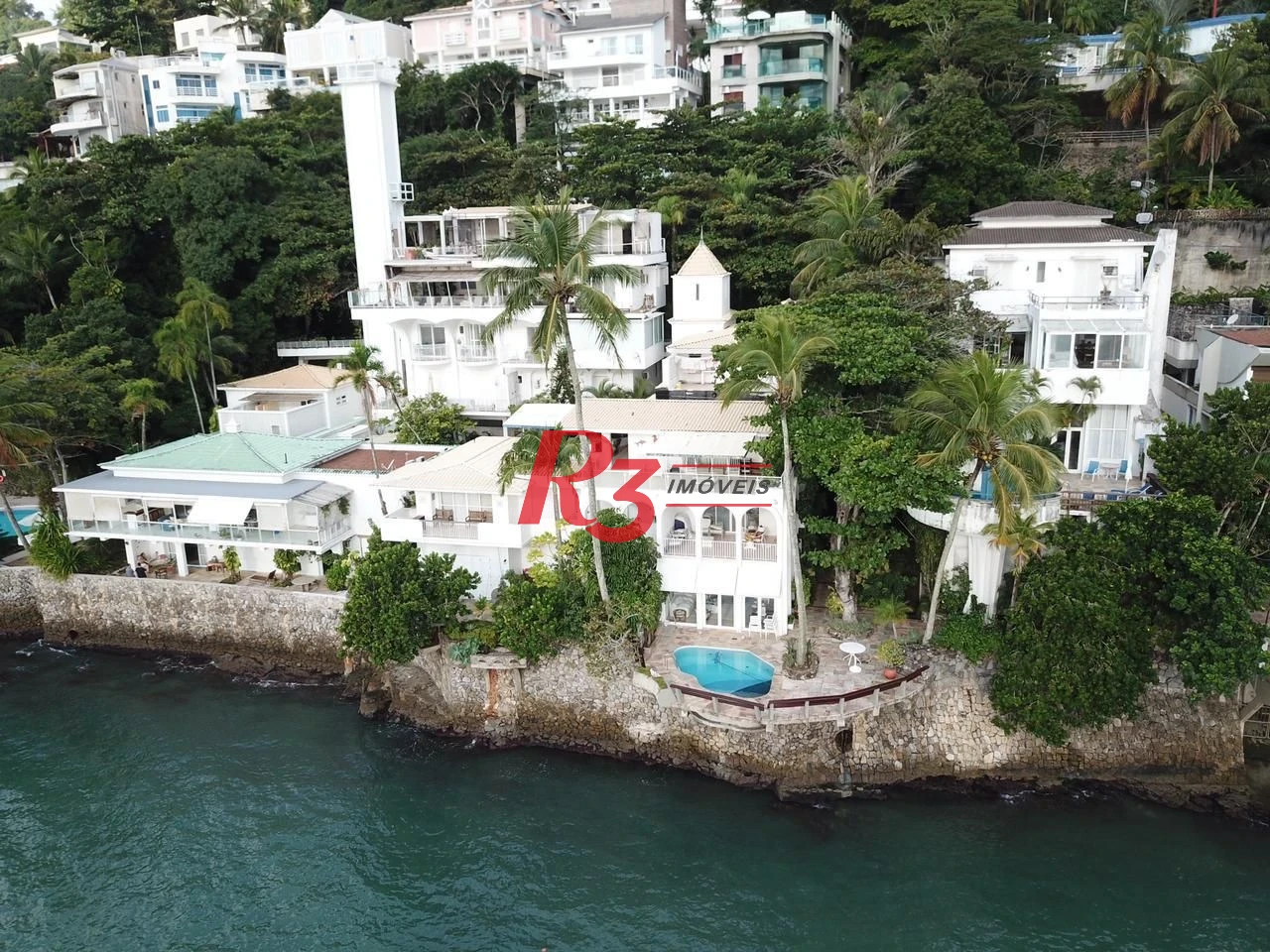 Casa com 4 dormitórios, 289 m² - venda por R$ 3.500.000 ou aluguel por R$ 13.900/mês - Loteamento João Batista Julião - Guarujá/SP