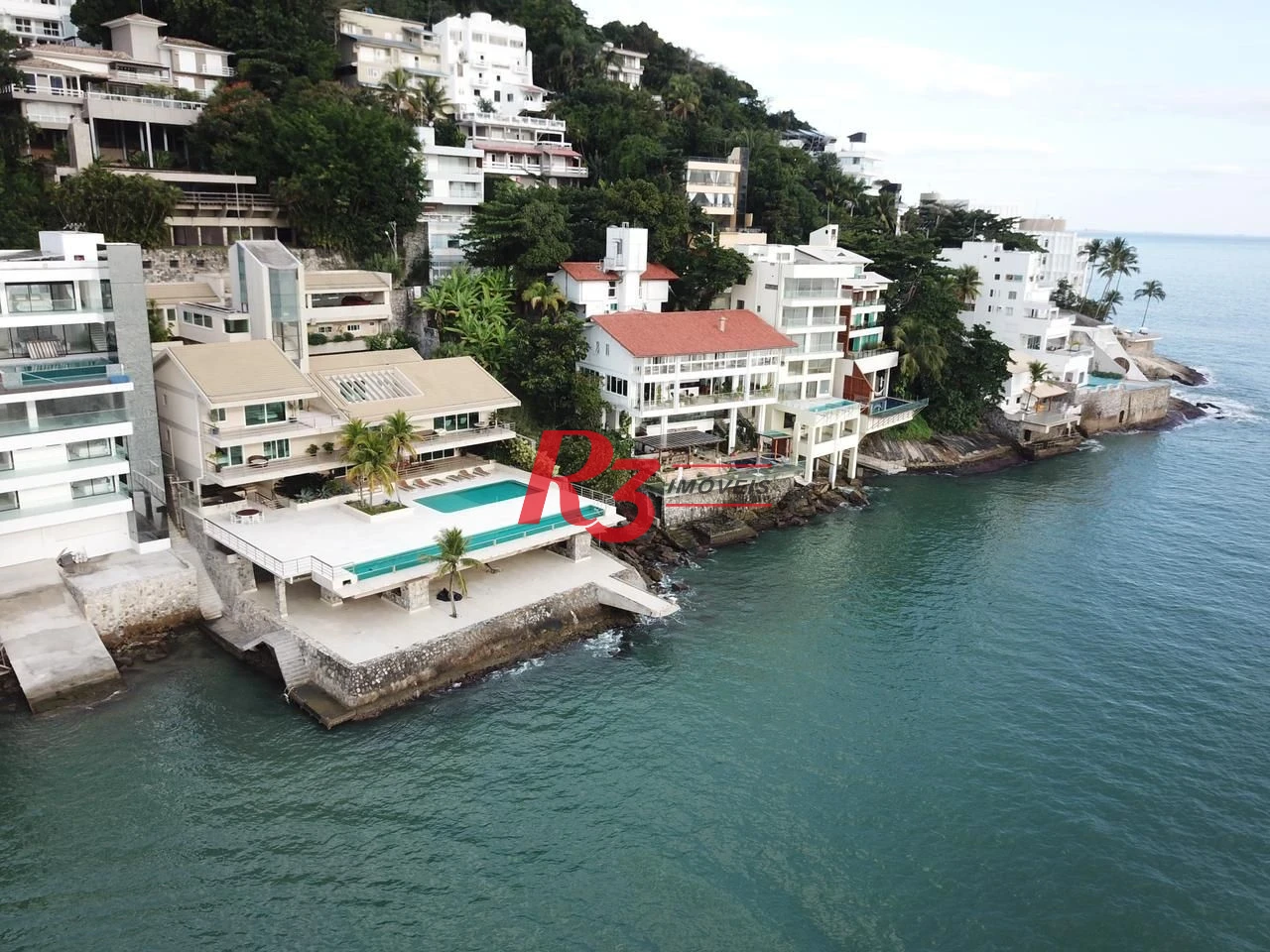 Casa com 4 dormitórios, 289 m² - venda por R$ 3.500.000 ou aluguel por R$ 13.900/mês - Loteamento João Batista Julião - Guarujá/SP